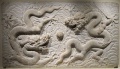 Chinese stone relief with dragon design.jpg